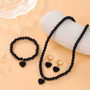 Black Heart Jewelry Set
Earrings, bracelet, necklace.